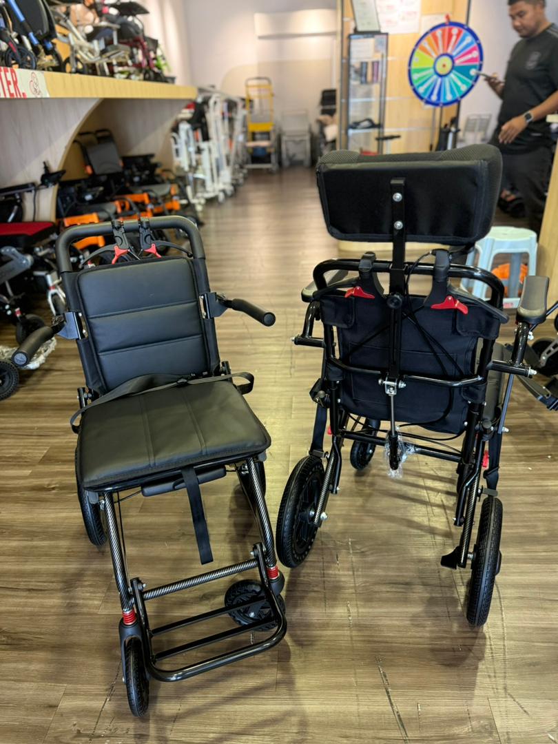 Two lightweight, portable Fresco Bike travel wheelchairs. Ideal for elderly or those needing compact mobility.