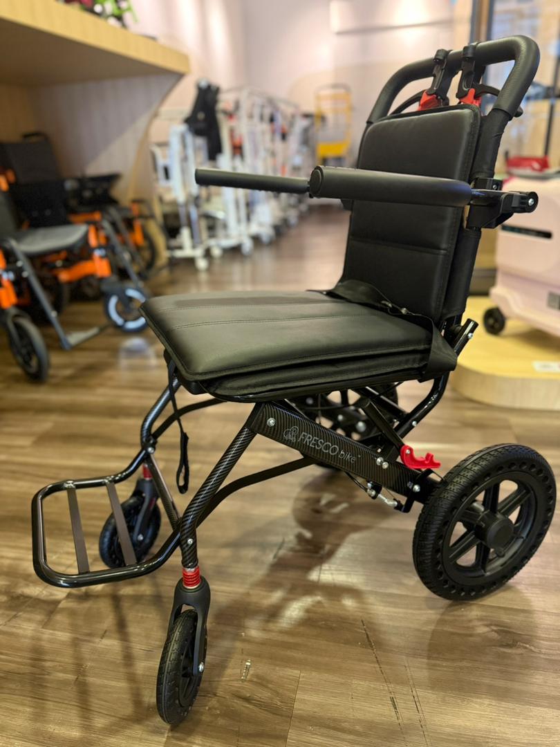 Fresco Bike lightweight travel wheelchair, easily foldable and portable for travel.